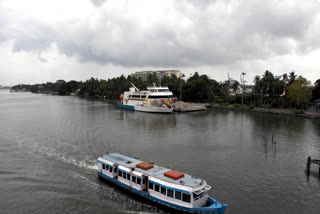 Dark clouds covering the sky loom over Kochi Back waters ahead of the Southwest Monsoon on May 27, 2020.