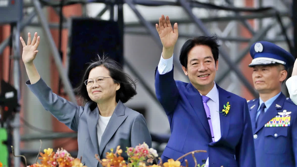 Taiwan's new President Lai Ching-te, right, and former President Tsai Ing-wen wave during Lai's inauguration ceremony in Taipei, Taiwan on May 20, 2024.