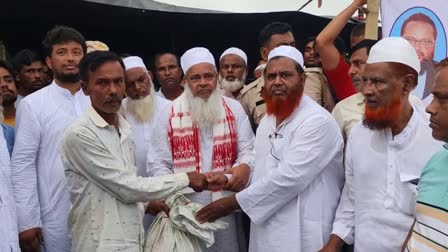 Badruddin Ajmal distributes flood relief