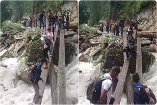 uttarkashi Villagers crossing the Gadera