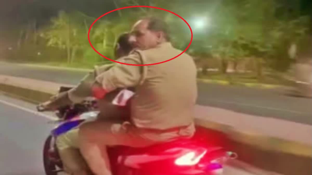 Police Driving without Helmet