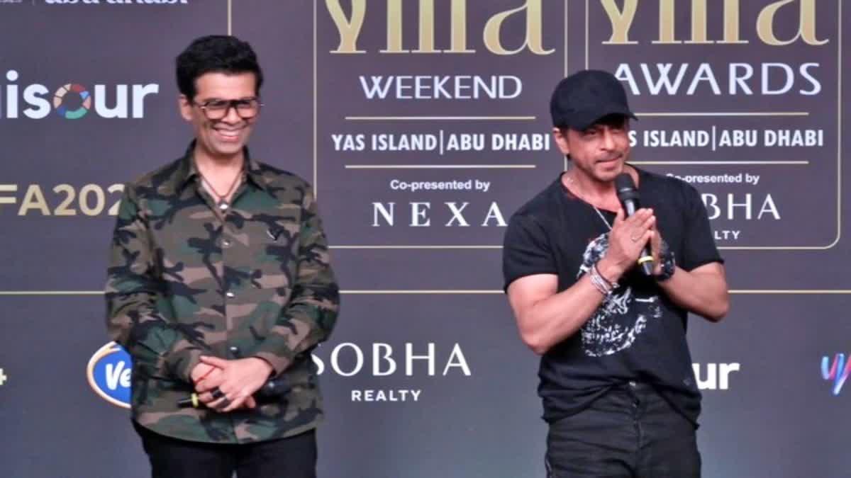 Shah Rukh Khan teases Karan Johar at IIFA event Make more films host less shows WATCH