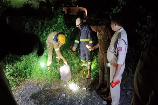 Investigators recover the remains of a LPG cylinder used to derail the Kalindi Express train in Uttar Pradesh's Kanpur