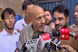 Baramulla MP Sheikh Abdul Rashid talking to reporters outside Tihar jail in New Delhi on Wednesday.