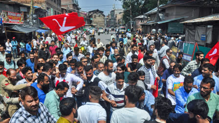 Jammu and Kashmir National Conference (JKNC) supporters gather during the filing of nomination papers of party candidates for the Jammu and Kashmir Assembly elections, in Srinagar on Sept 4, 2024.