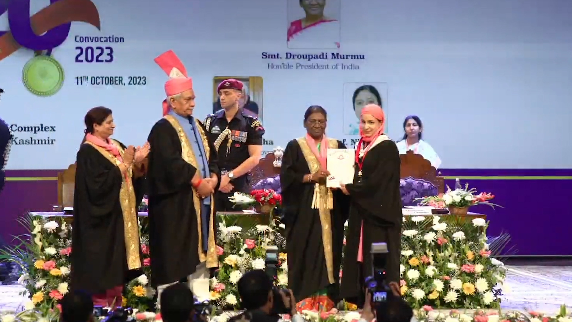 President Murmu giving certificates to students