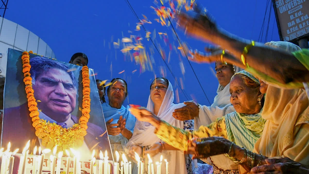 Jamshedpur community puja committees observed a simplified celebration, refraining from music to respect Ratan Tata, who significantly contributed to the city's development.