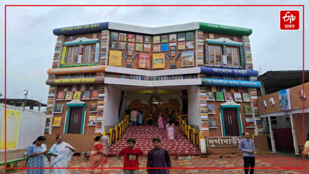 Tezpur puja pandal built with the theme of library and book