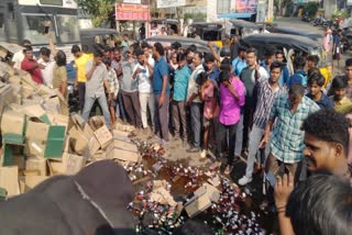 Truck Carrying Alcohol Overturns in vishaka