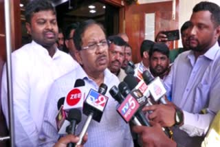 Minister Parameshwar spoke to reporters.