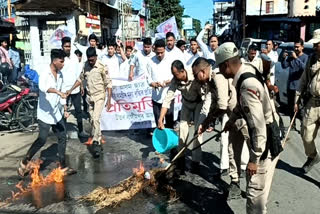 AASU burnt Supplies Ministers portrait