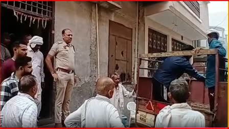 Police outside the victim's house in Bhiwani