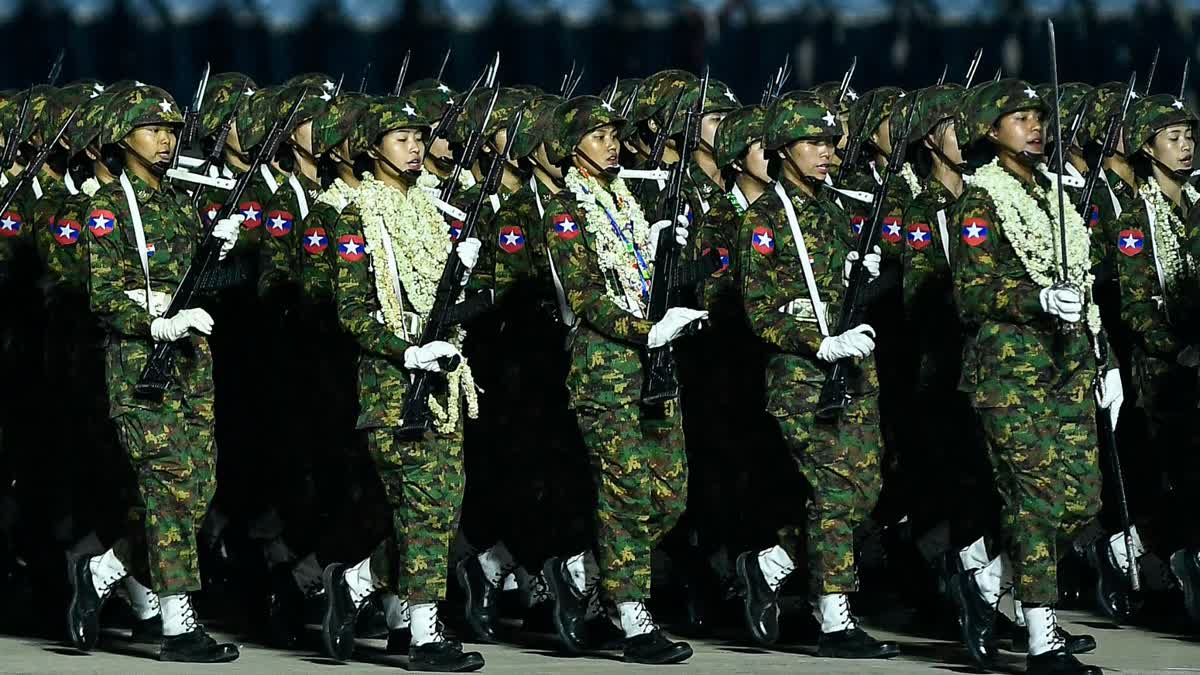 File photo of Myanmar junta military soldiers parade during a ceremony to mark the country's Armed Forces Day in Naypyidaw on March 27, 2024. Myanmar's junta chief on March 27, 2024 blamed the country's growing armed resistance movement for preventing long-promised elections in a speech to thousands of soldiers following an Armed Forces Day parade.