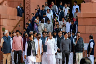 opposition MPs on Wednesday greeted their BJP counterparts in Parliament premises with the tricolour in one hand and a red rose in the other on Wednesday.