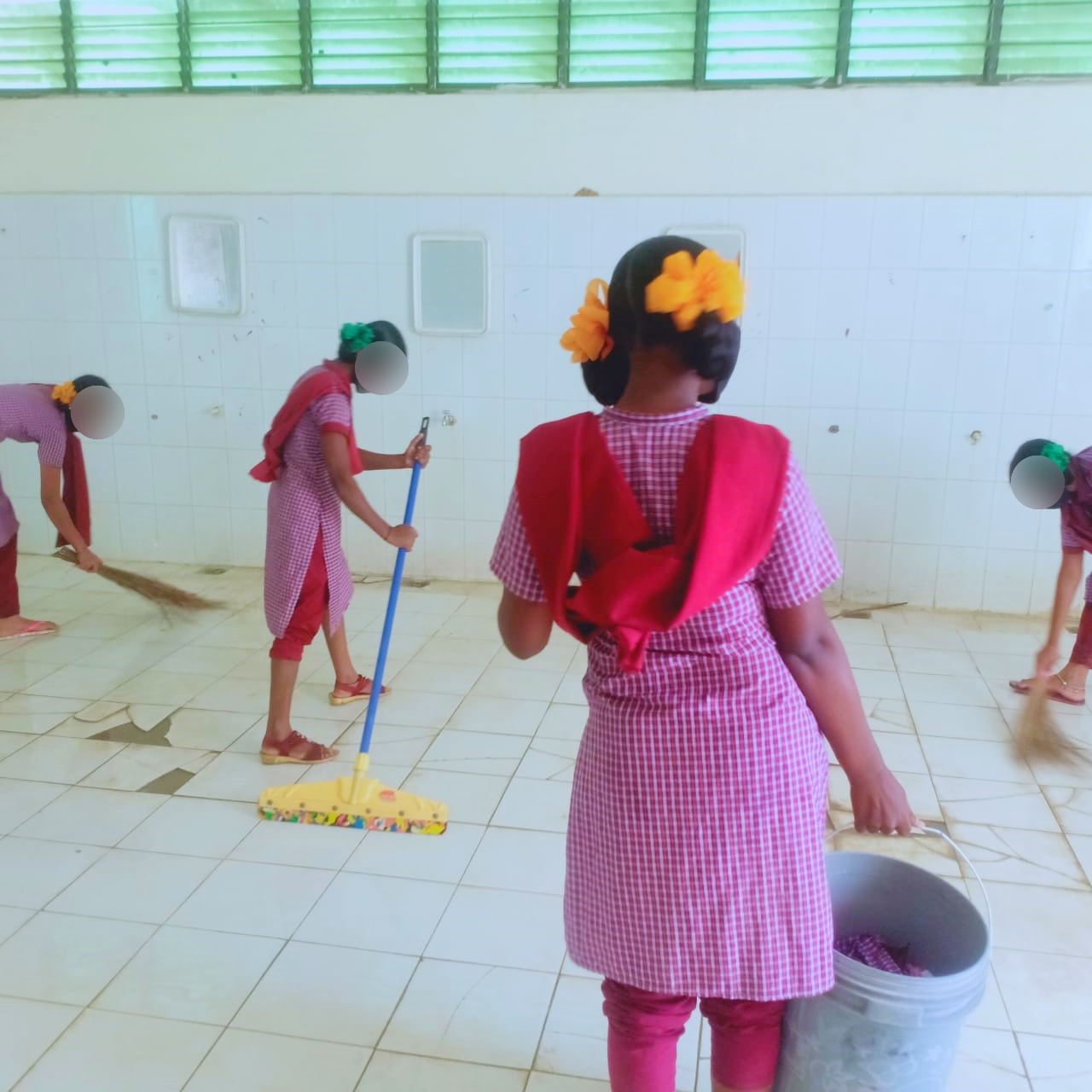 gurukula students doing sanitation works in toguta school