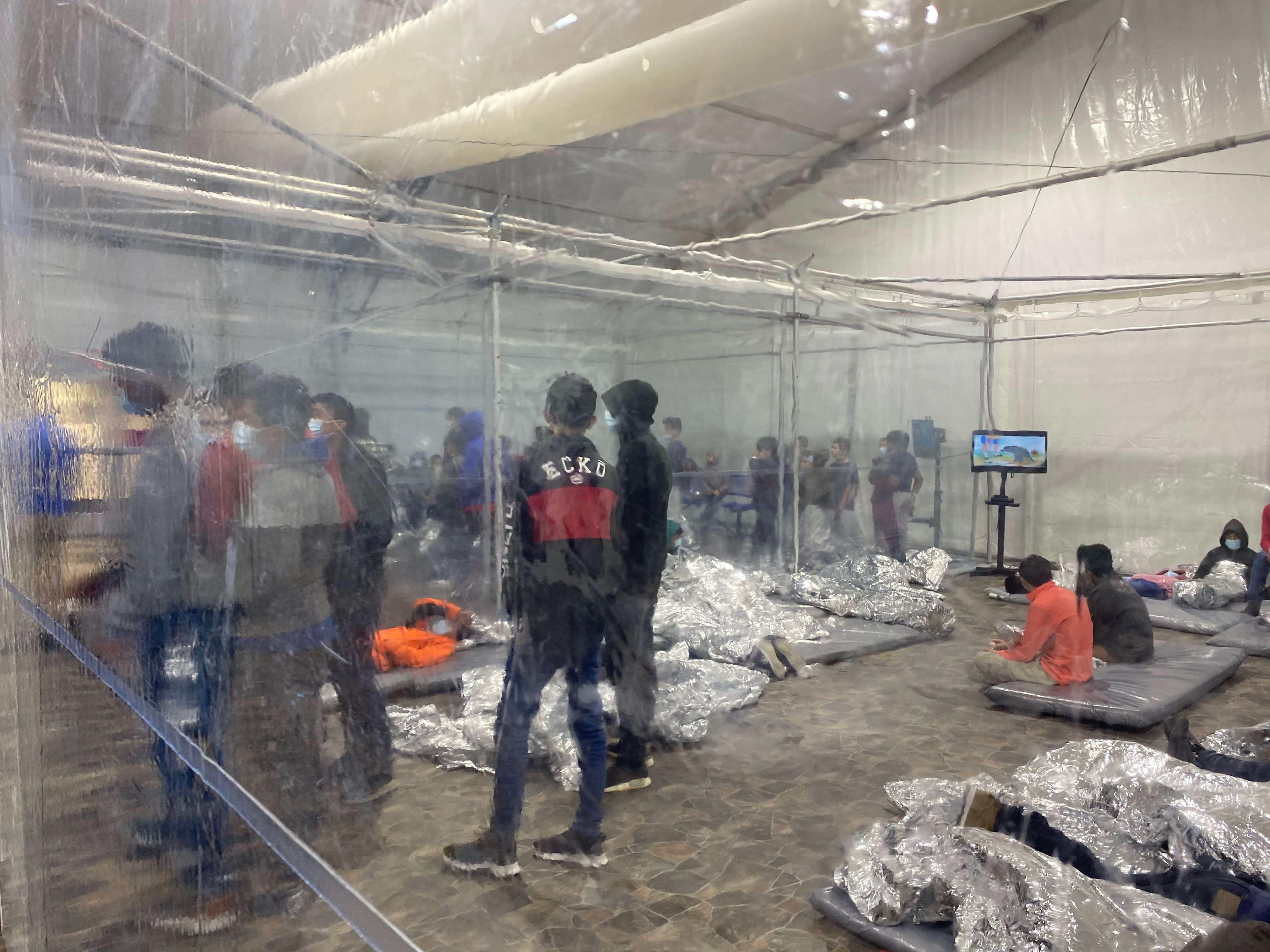 Photos of migrant detention highlight Biden's border secrecy