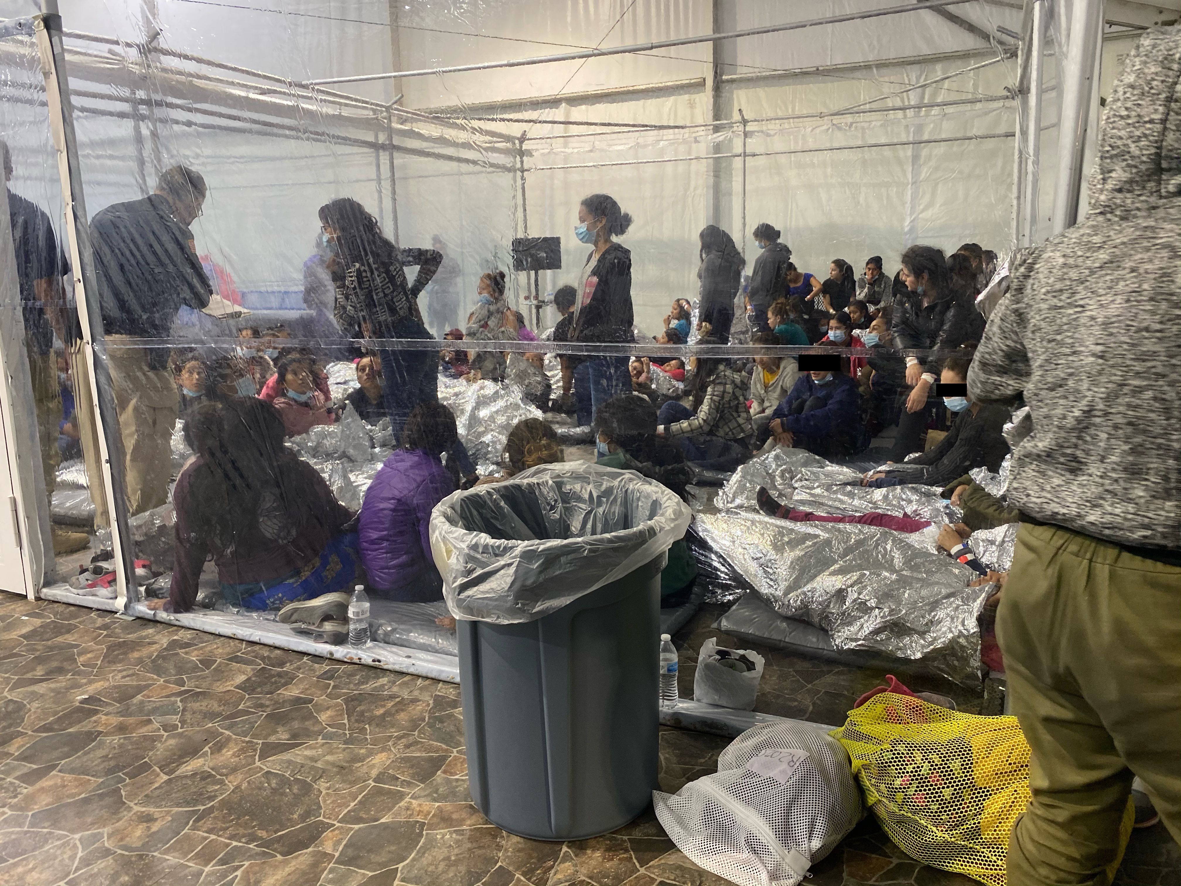 Photos of migrant detention highlight Biden's border secrecy