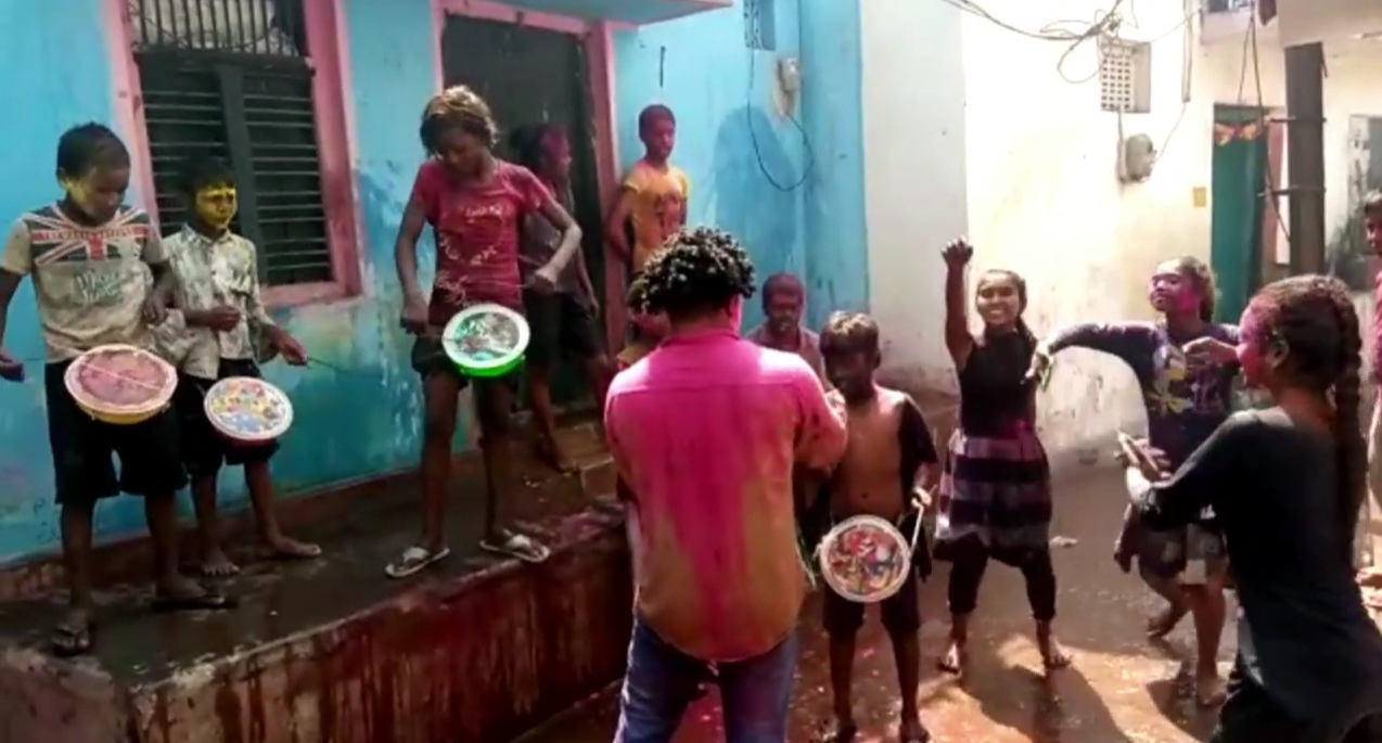 Children playing Holi