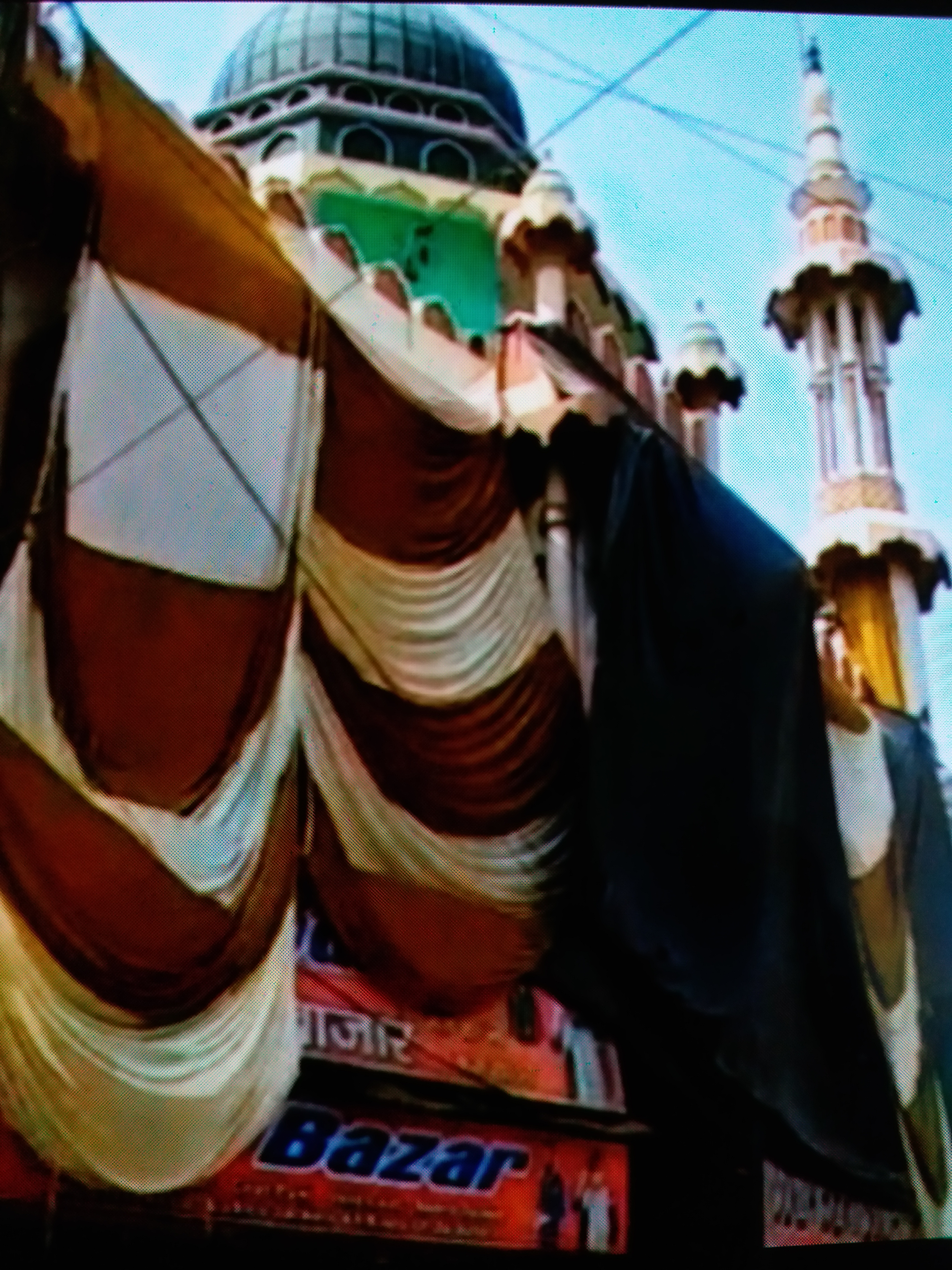 aligarh mosque covered by local people due to holi