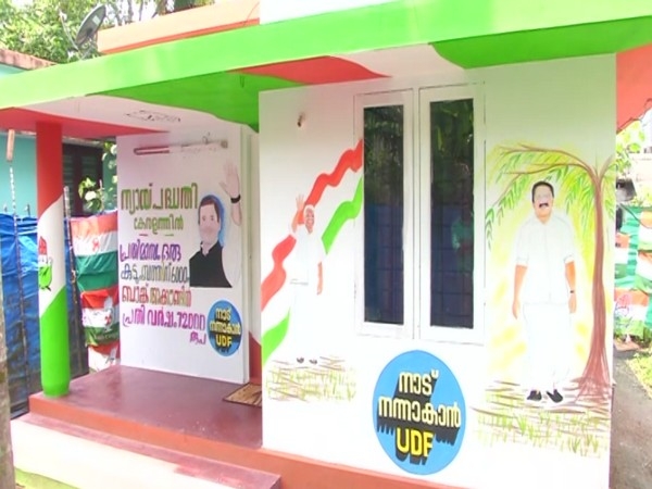 Kerala polls: Congress worker paints house with faces of party leaders