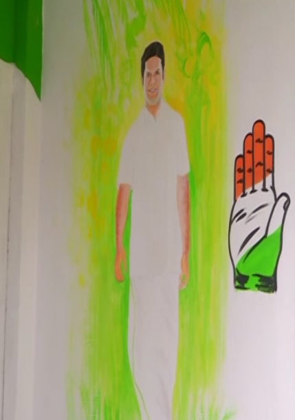 Kerala polls: Congress worker paints house with faces of party leaders