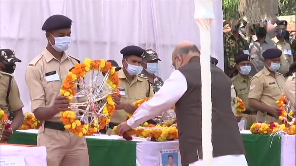 Union Home Minister Amit Shah and Chief Minister Bhupesh Baghel lay wreath at the coffins of 14 security personnel