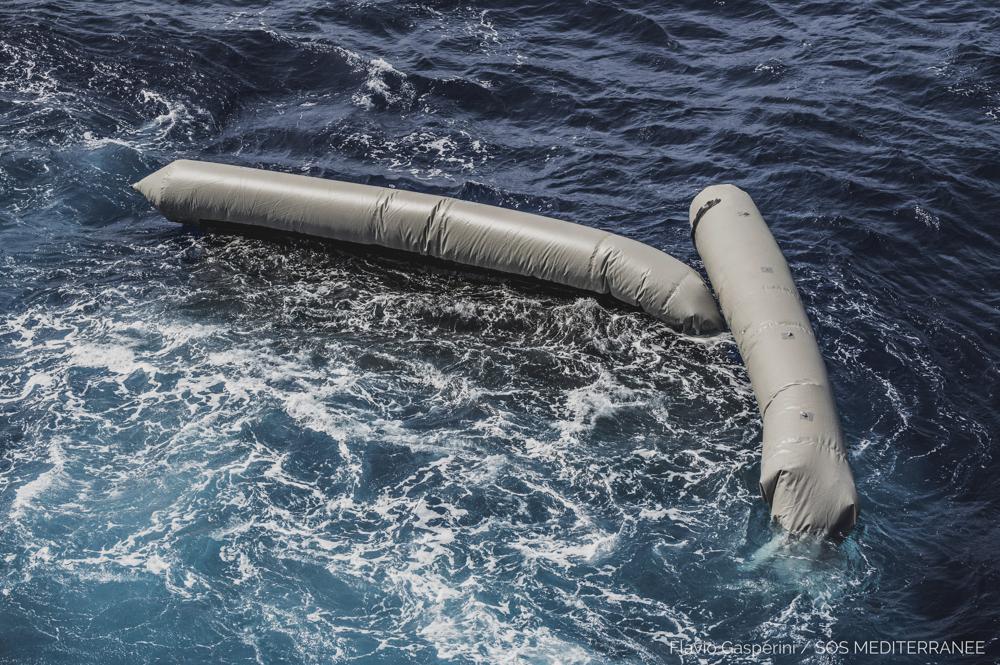 Debris from a dinghy which was supposedly carrying over 100 migrants are seen floating in the Mediterranean Sea northeast of the Libyan capital, Tripoli