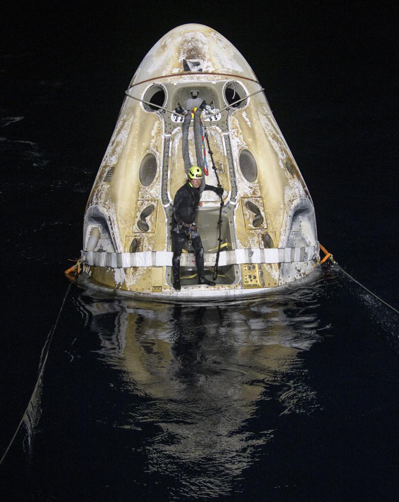 The Dragon capsule parachuted into the Gulf of Mexico off the coast of Panama City, Florida, just before 3 a.m.