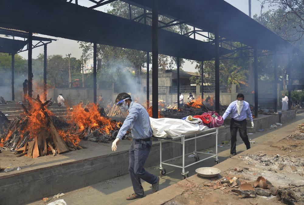 Crematorium staffs taking the body for cremation