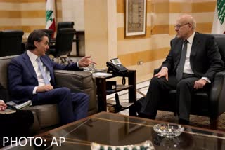 Senior Advisor to U.S. President Joe Biden Amos Hochstein, left, gestures as he meets with Lebanese caretaker Prime Minister Najib Mikati, in Beirut, Lebanon