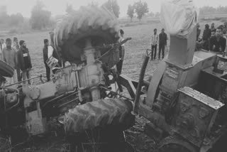 tractor overturns