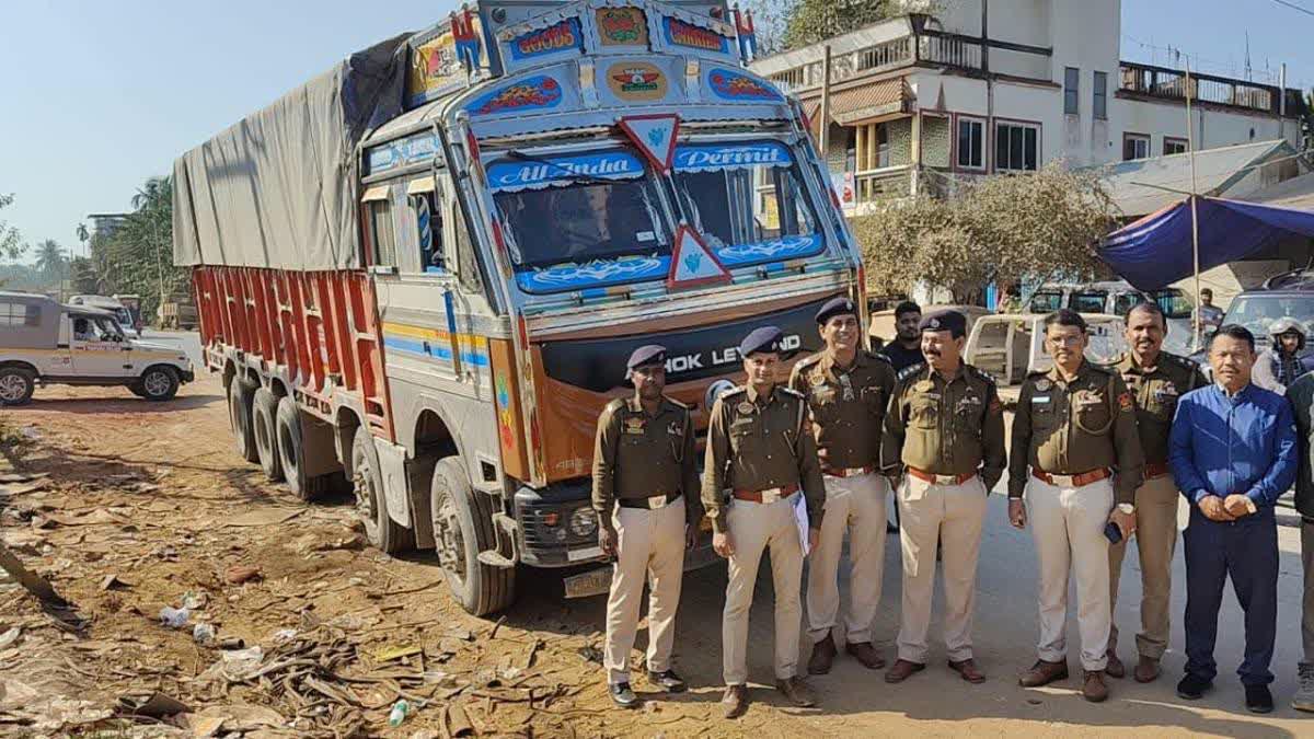 Tripura Police with the seized truck