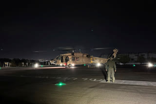 In this photo provided by the Israeli military, shows an Israeli Air Force helicopter carrying two released hostages, at Sheba Medical Center in Ramat Gan, Israel, Monday, Feb, 12. 2024. The Israeli military said early Monday that it had rescued two hostages from captivity in the Gaza Strip. It said the two men were rescued in the southern Gaza town of Rafah and were in good condition at an Israeli hospital. (Israel Defense Forces via AP)
