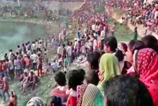 Villagers at the Fagua Pond during Holi celebrations.
