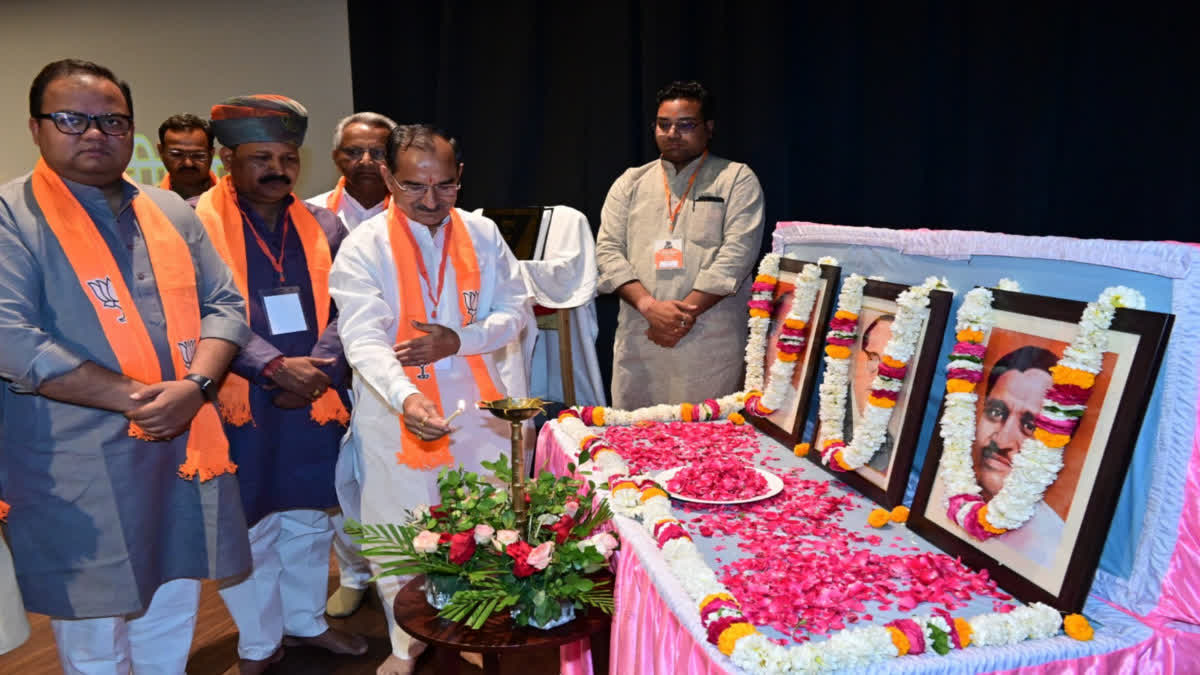 BJP officials paying tribute to Ambedkar in state level workshop