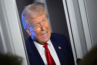 President Donald Trump speaks to reporters while in flight on board Air Force One, en route to Miami, Thursday, April 3, 2025.