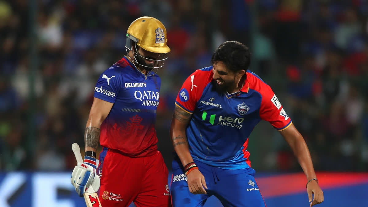 Virat Kohli and Ishant Sharma had a friendly banter on the field when the former got out against the latter after hitting him for a six and a boundary in the same over during the match between Royal Challengers Bengaluru and Delhi Capitals in the ongoing 17th edition of the Indian Premier League (IPL) at M Chinnaswamy Stadium in Bengaluru on Sunday.