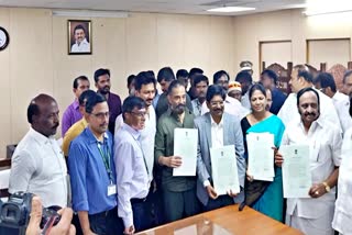 Winning Rajya Sabha candidates from Tamil Nadu showing certificates.