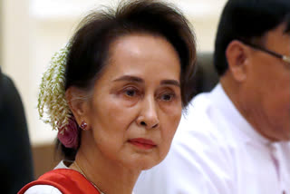 Thai diplomat meets with Suu Kyi in detention in Myanmar and says she wants to join talks on crisis