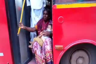 The grandmother who did not get a seat in the bus sat on the board with her grandson