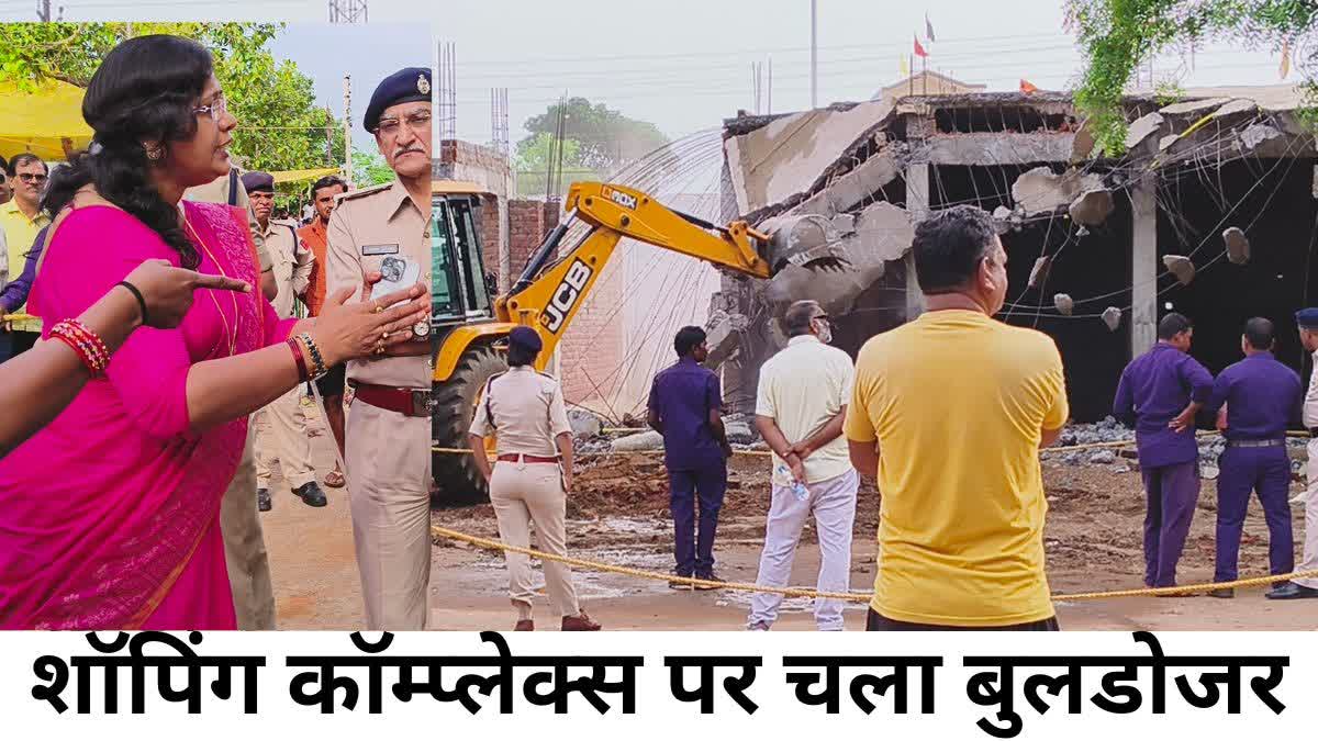 Bulldozer action on Shoping complex