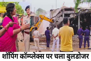 Bulldozer action on Shoping complex