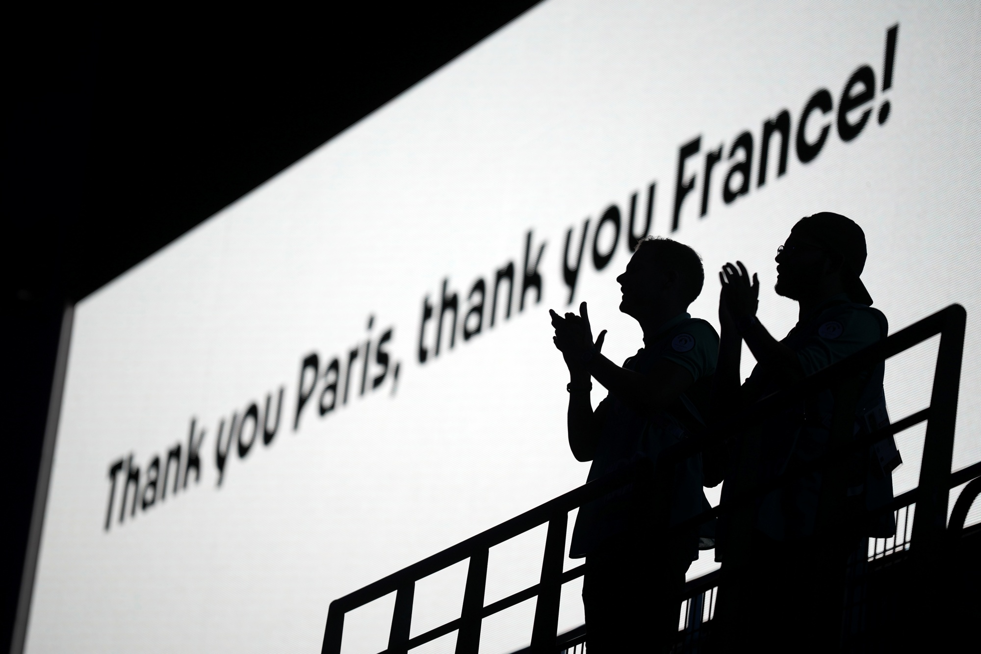 Spectators applaud during the 2024 Summer Olympics closing ceremony at the Stade de France, Sunday, Aug. 11, 2024, in Saint-Denis, France.