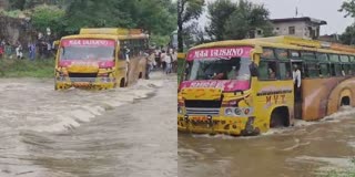 BUS CROSS OVERFLOWING RIVER