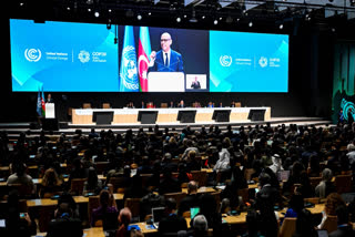 UN climate chief Simon Stiell delivers a speech during the opening of the 2024 United Nations Climate Change Conference (COP29) in Baku on November 11, 2024.