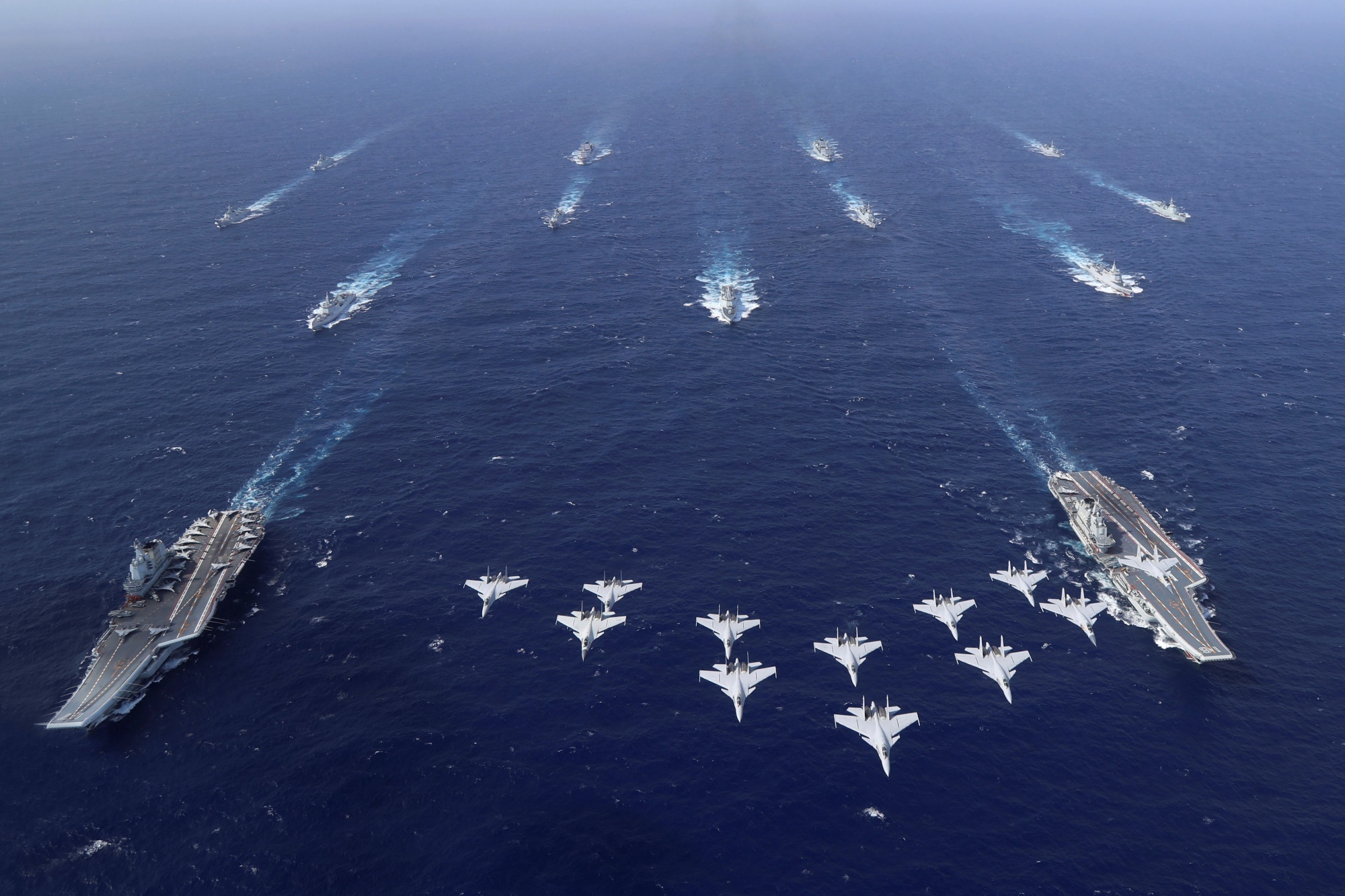 Conventionally powered Chinese aircraft carriers Liaoning and Shandong carry out a dual aircraft carrier formation exercise for the first time in the South China Sea in late October 2024.