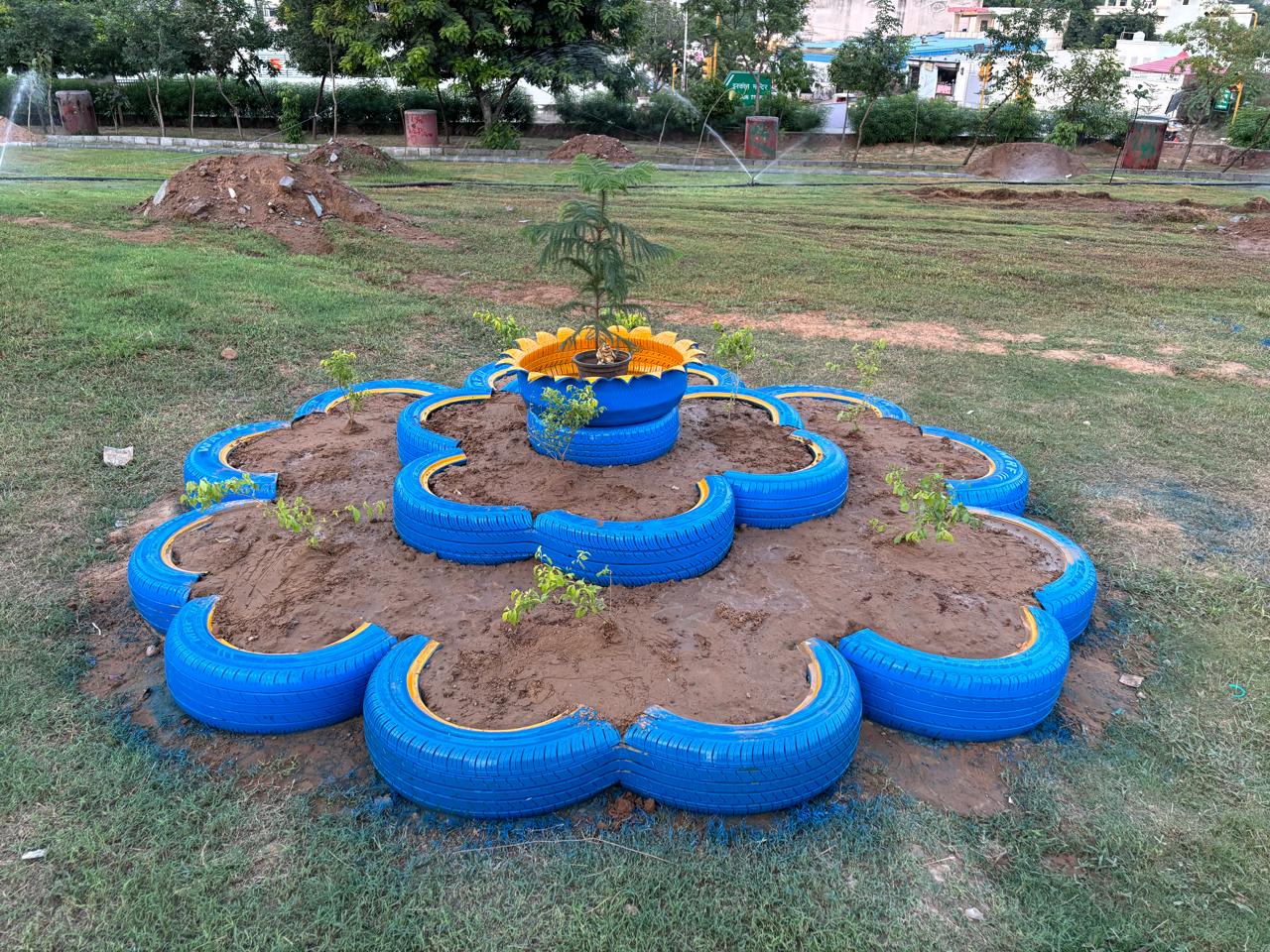 Old tyres used for growing flowers at Waste To Wonder Park in Jaipur, Rajasthan. The unique initiative is turning trash into utility