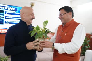 Anupam Kher and Pushkar Singh Dhami