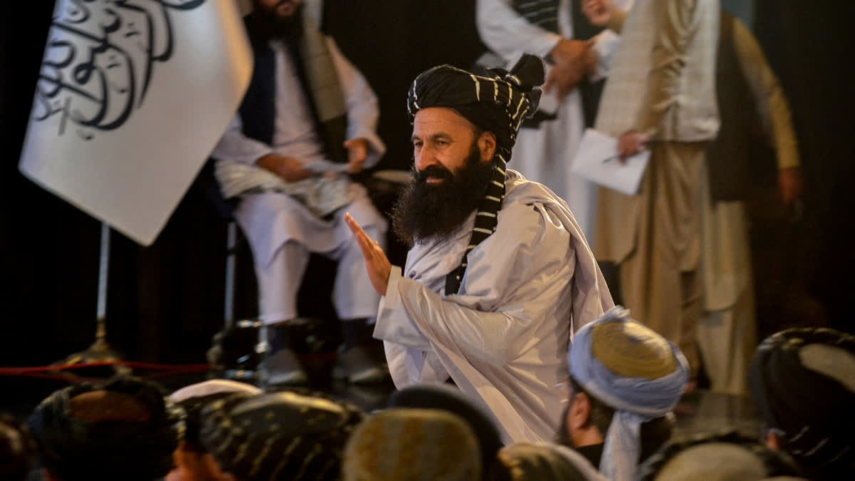 Afghanistan's minister for refugees, Khalil Ur-Rahman Haqqani arrives to attend a gathering held to mark the first anniversary of their return to power in Afghanistan in Kabul on August 15, 2022.