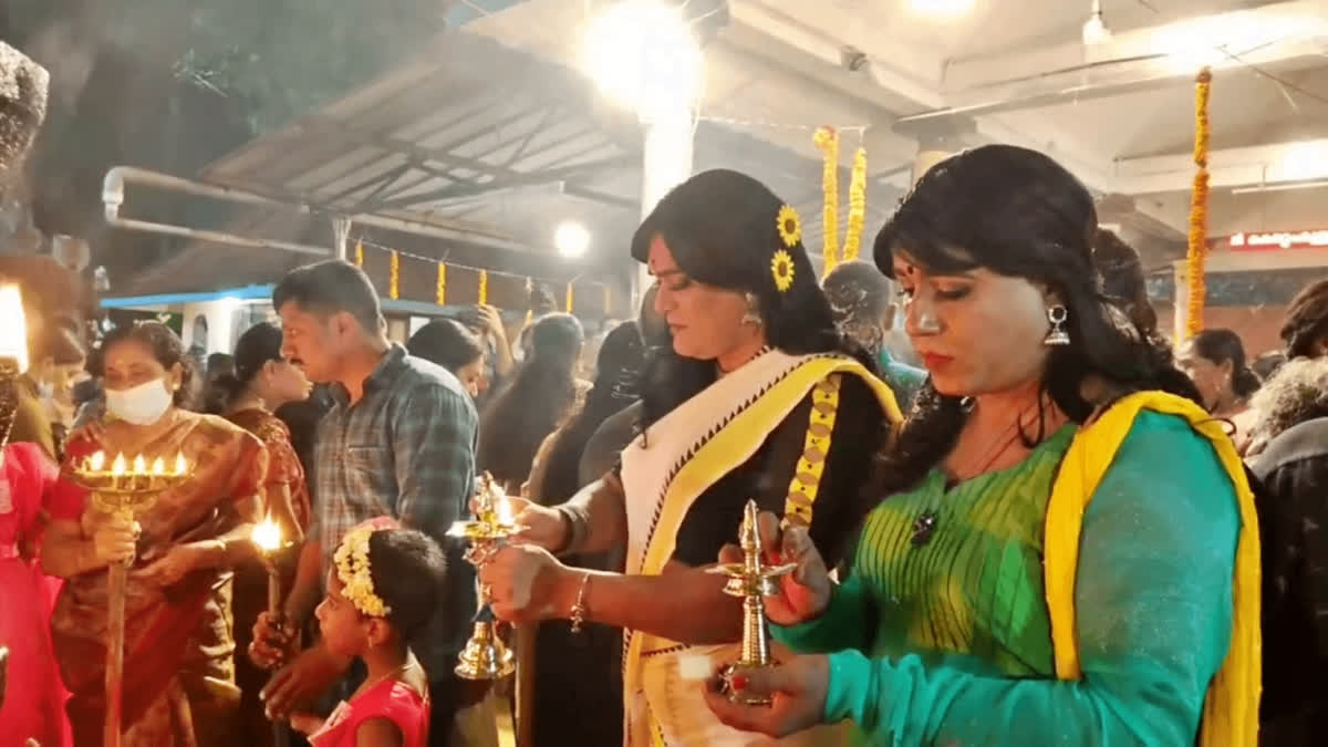 Kerala Men crossdress, offer prayers on 'Chamayavilakku' at